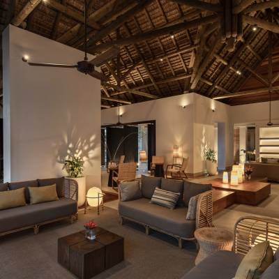 a living room filled with furniture and a large window