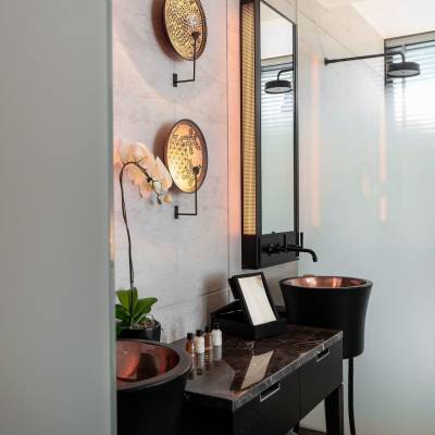 a room that has a clock on a table