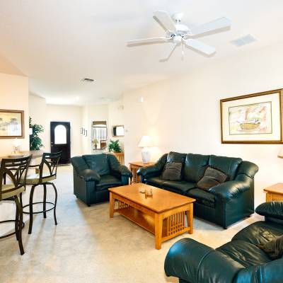 a living room filled with lots of furniture