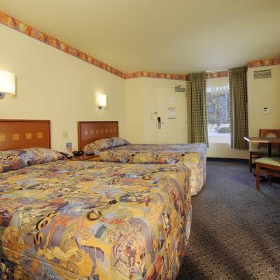 a bedroom with a bed in a room