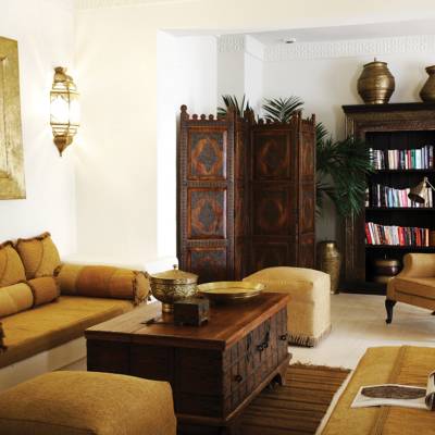 a living room filled with furniture and a fireplace