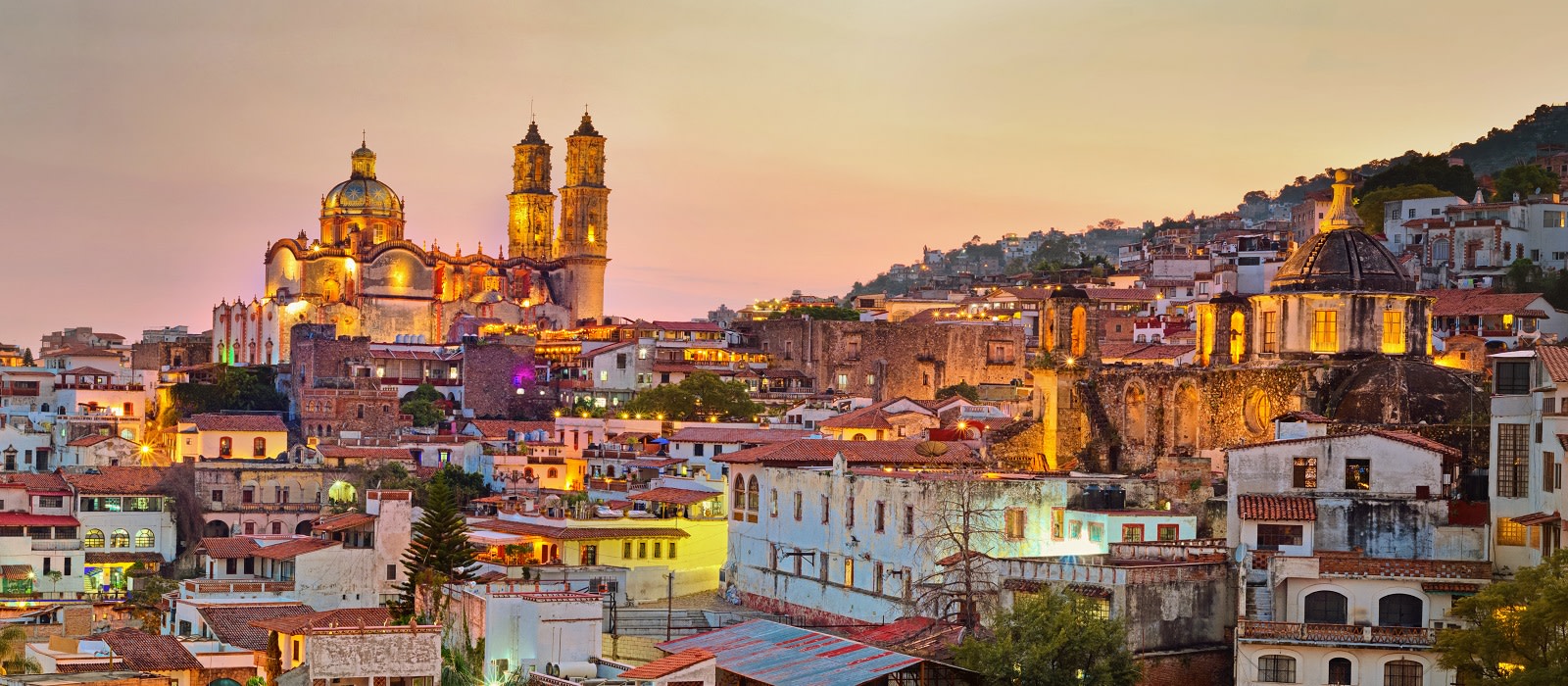 Enchanting Travels Mexico Tours Panorama of Taxco city at sunset in Mexico Enchanting Travels Mexico Tours Panorama of Taxco city at sunset in Mexico - things to do in Mexico