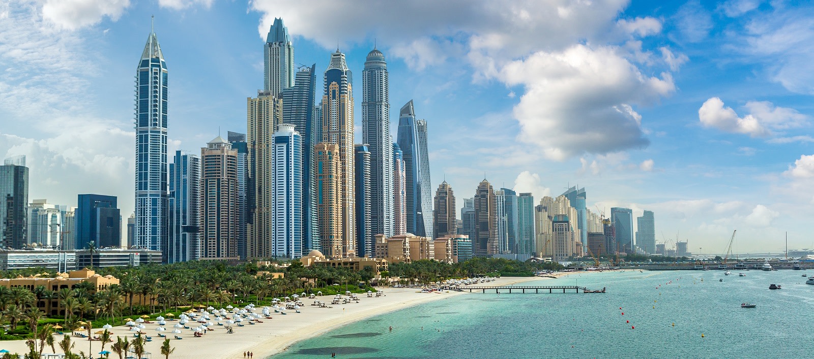 Enchanting Travels UAE Tours Dubai Marina in a summer day, United Arab Emirates Enchanting Travels UAE Tours Dubai Marina in a summer day, United Arab Emirates