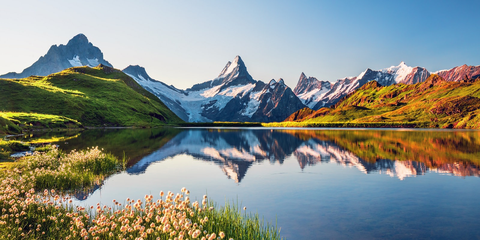 Sunrise view on Bernese range above Bachalpsee lake (1) best time to visit Switzerland
