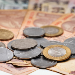Indian Currency different Rupee bank notes and coins background