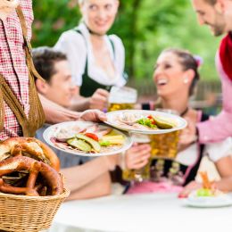 Waiter serving food in Bavaria, Germany Tours, Europe