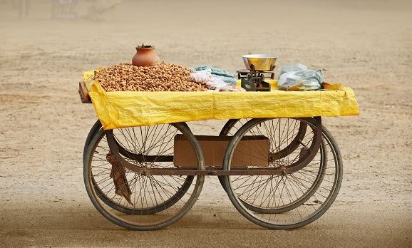movable-counter-to-sell-roasted-peanuts-india-rajasthan-india-asia-shutterstock_123743368