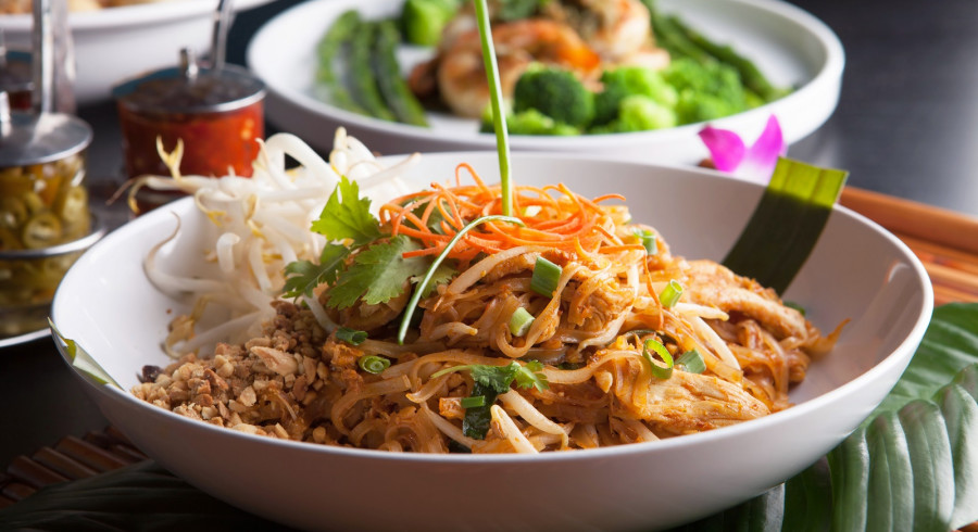 Chicken pad Thai with a variety of other fine Thai food dishes