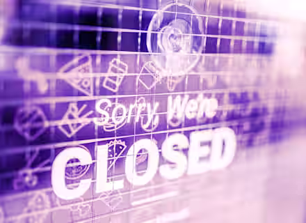 A close-up image of a glass door with a sign that reads, "Sorry, We're CLOSED." The background is decorated with various light illustrations of food items. The overall tone of the image is tinted purple, creating a unique and stylized appearance.