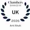 A blue laurel wreath surrounds the text: "Chambers Ranked in UK 2026 Arti Shah" on a white background.