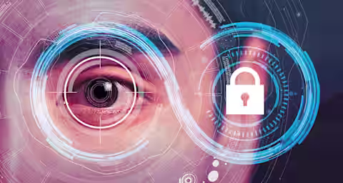 Close-up of a person's eye surrounded by digital and biometric interface elements, including circular patterns and a lock icon, representing cybersecurity and identity verification. The image conveys the integration of technology in security systems.