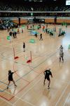 A wide image of multiple sports being played at the Copper Box Arena.