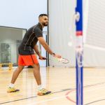 man playing badminton