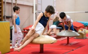 gymnasts doing tricks
