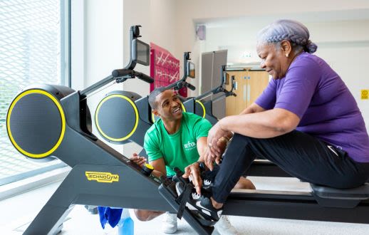 lady on rowing machine lady on rowing machine