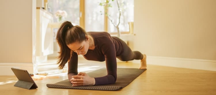 Woman on the mat with ipad