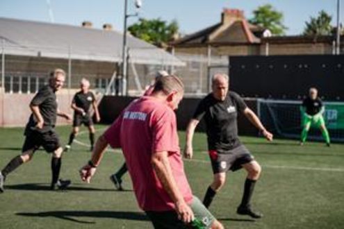 people playing walking football people playing walking football