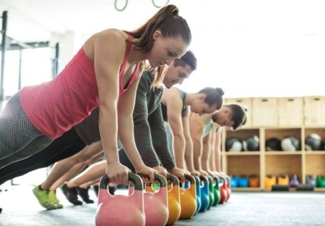 Adult kettlebell class in progress