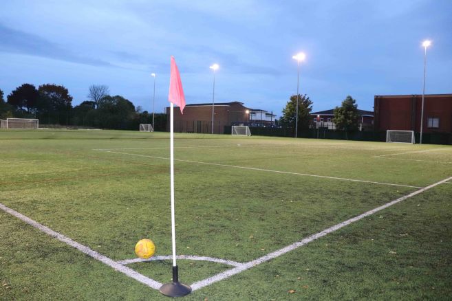 Day-time view of all weather pitch from corner angle
