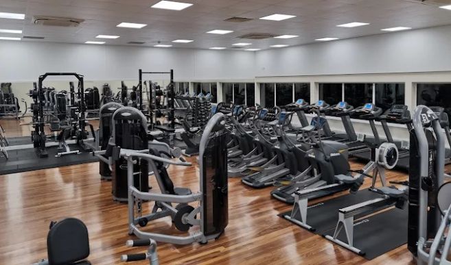 Overall layout view of equipment and machines in gym 
