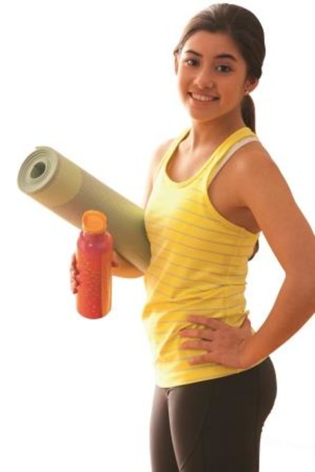 Adult_female_with_yoga_matt_-_Small.jpg Student with yoga mat