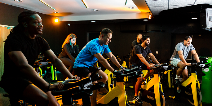 A group of people taking part in a Group Cycle class