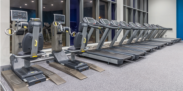 a view of the cardio gym at East Manchester with exercise machines