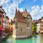 Medieval Buildings Lined Along Lake Annecy 