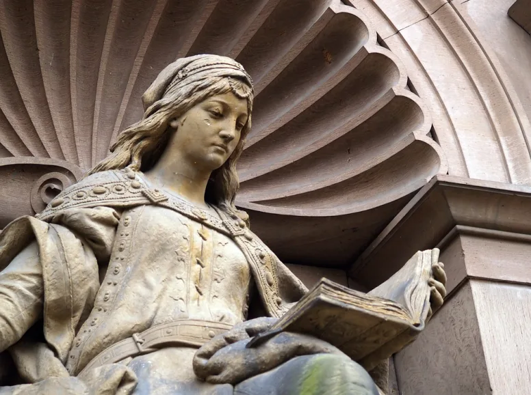 Statue of a Woman Reading in Heidelberg 