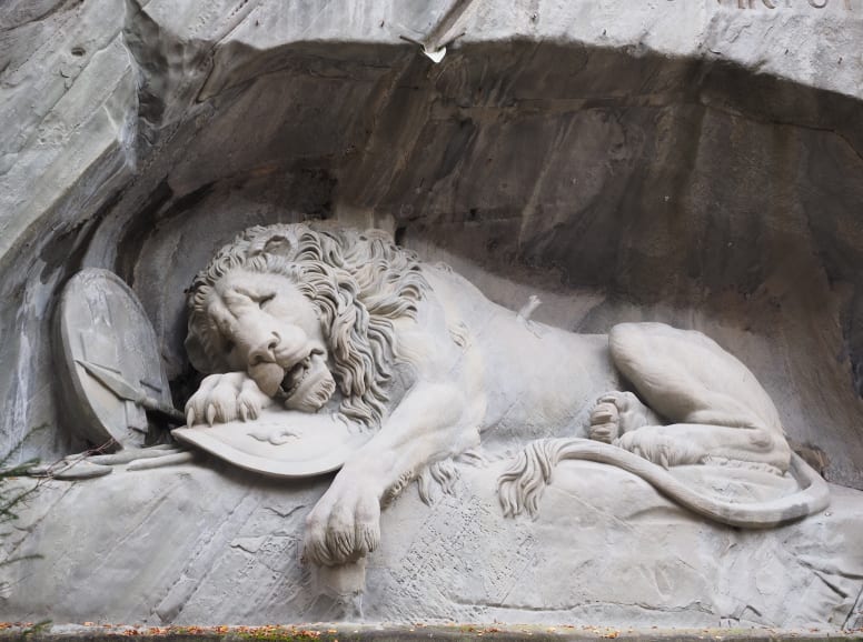 Lucerne Lion Sculpture Laying in a Cliff