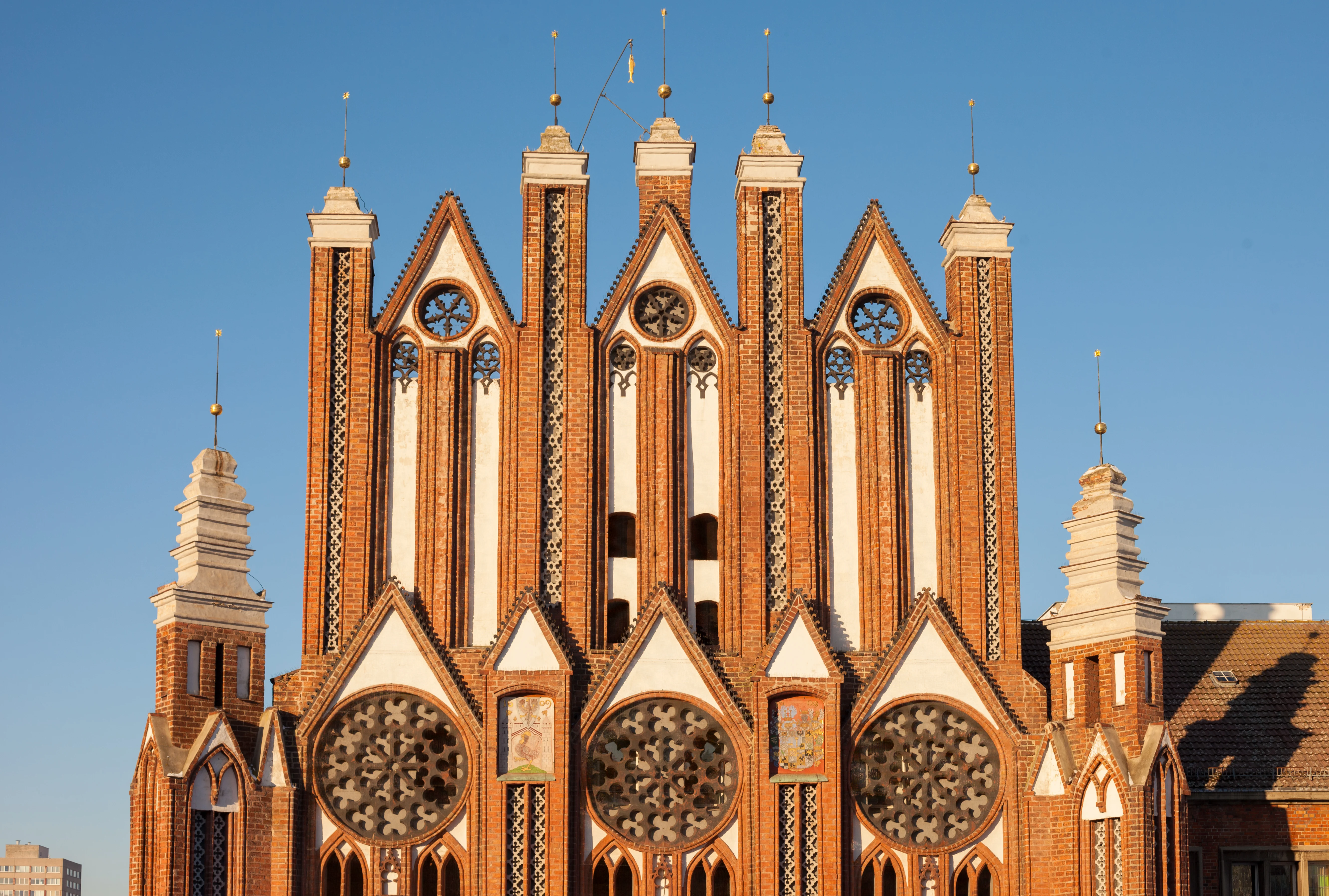 A red brick building with white trim and 