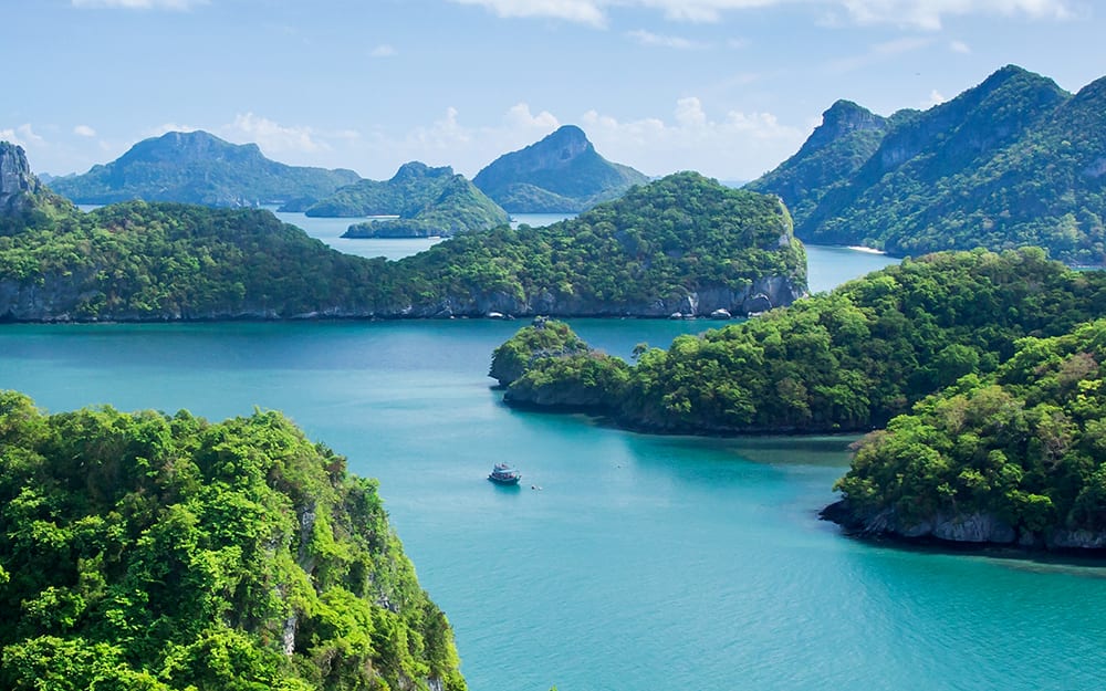 A Boat Cruises Along the Ang Thong National Marine Park in Koh Samui