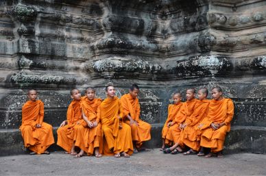 Monks in Orange Robes at Angkor Wat