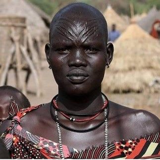 Exploring the Ancient Art of Scarification: Tradition, Beauty, and Identity in African and Aboriginal Cultures