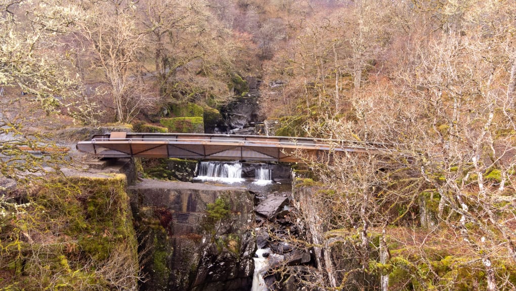 Side view of Bracklinn Falls Footbridge. Copyright Timlapse Scotland