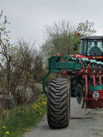 Kverneland BE transported on road by tractor