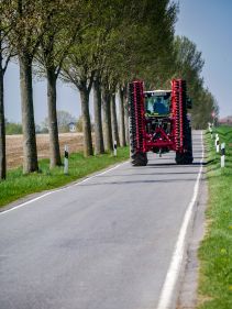 Kverneland F35 compact travelling on road with tractor