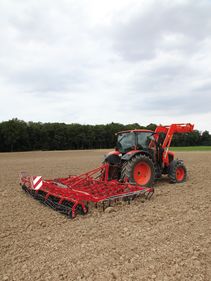 Seedbed Cultivators - Kverneland TLF performs precise depth control during operation on field