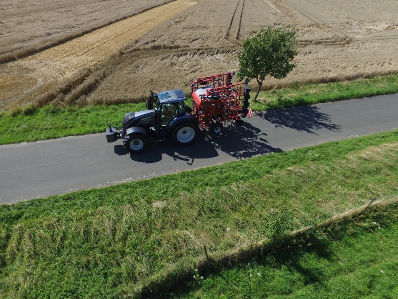 Kverneland ts-drill, transported compact on road by tractor