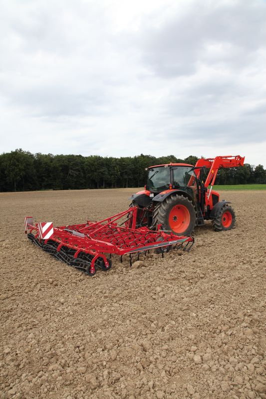 Seedbed Cultivators - Kverneland TLF performs precise depth control during operation on field