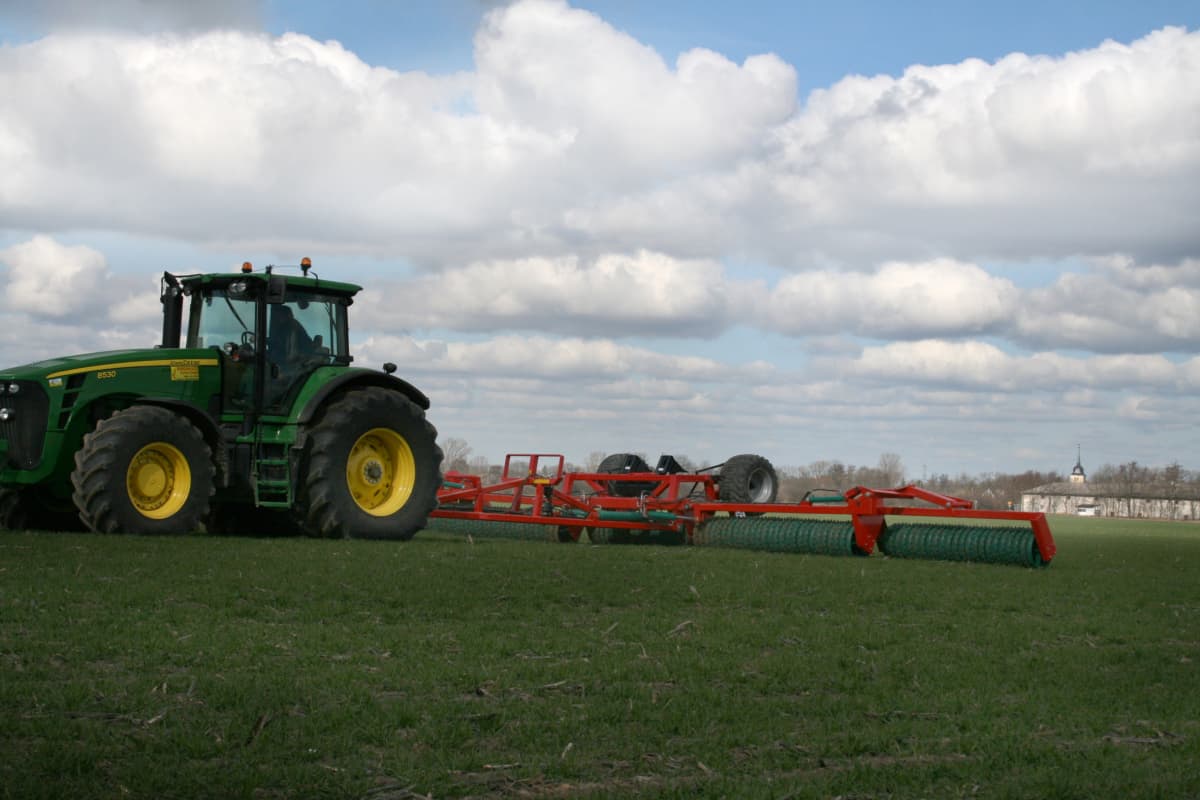 after winter, efficient levelling and soil compaction on field