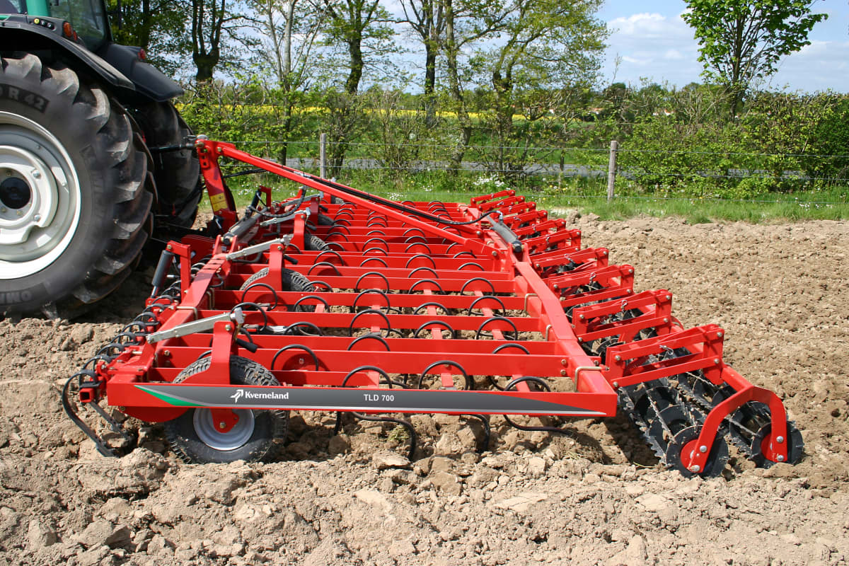 Seedbed Cultivators - Kverneland TLF performs precise depth control during operation on field