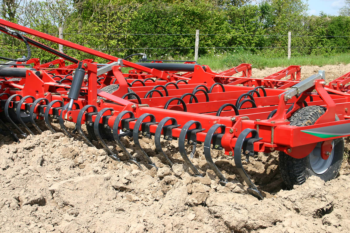 Seedbed Cultivators - Kverneland TLF performs precise depth control during operation on field