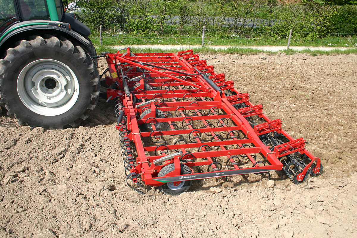 Seedbed Cultivators - Kverneland TLF performs precise depth control during operation on field