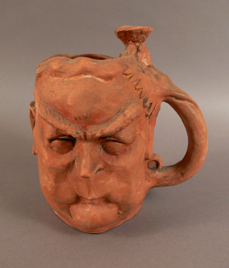 Jug sculpted in the shape of Robert Menzies by John Frith.