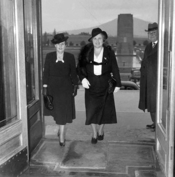 Australia's first female federal politicians, Senator Dorothy M Tangney (left) and Dame Enid Lyons GBE, entering the front door of the House of Representatives. 1943. Australian War Memorial.