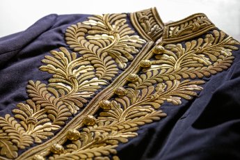 Detail of Sir Edmund Barton’s coatee. In 1902 he wore this gold-embroidered wool uniform at the coronation of King Edward VII in London. Museum of Australian Democracy Collection.
