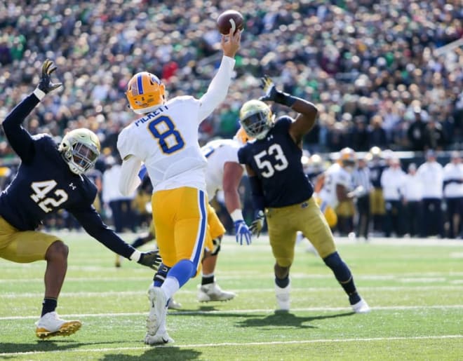 Former Notre Dame defensive ends Julian Okwara and Khalid Kareem putting pressure on the quarterback against Pittsburgh on 2018