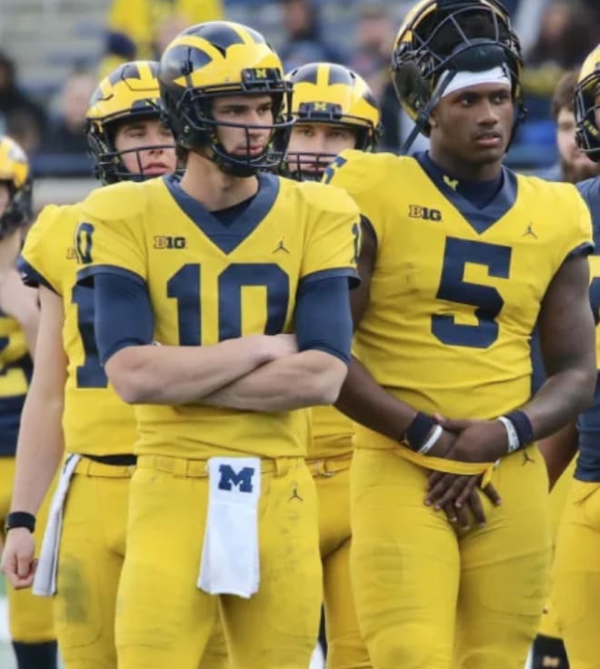 Michigan Wolverines football quarterbacks Dylan McCaffrey (left) and Joe Milton