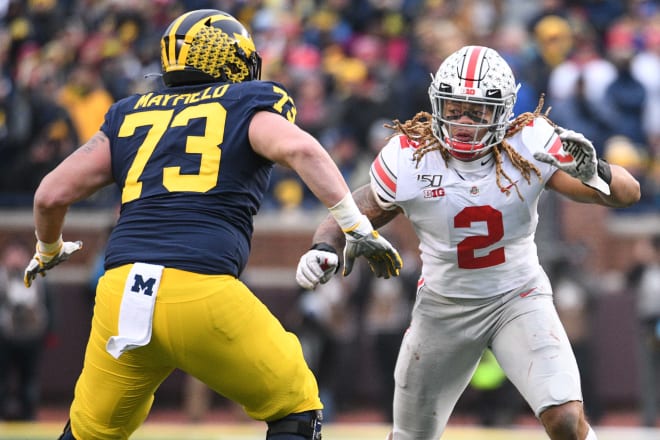 Michigan Wolverines right tackle Jalen Mayfield prepares to block Chase Young